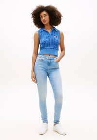 Tommy Jeans NORA FADED - Oprijete (skinny) kavbojke - denim light