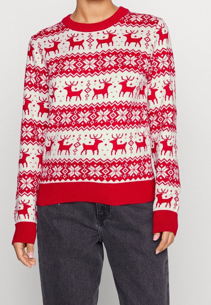 Roter und weißer Pullover mit Rentier- und Schneeflockenmuster, Rundhalsausschnitt, gerippte Bündchen und Saum, aus Strickstoff gefertigt.