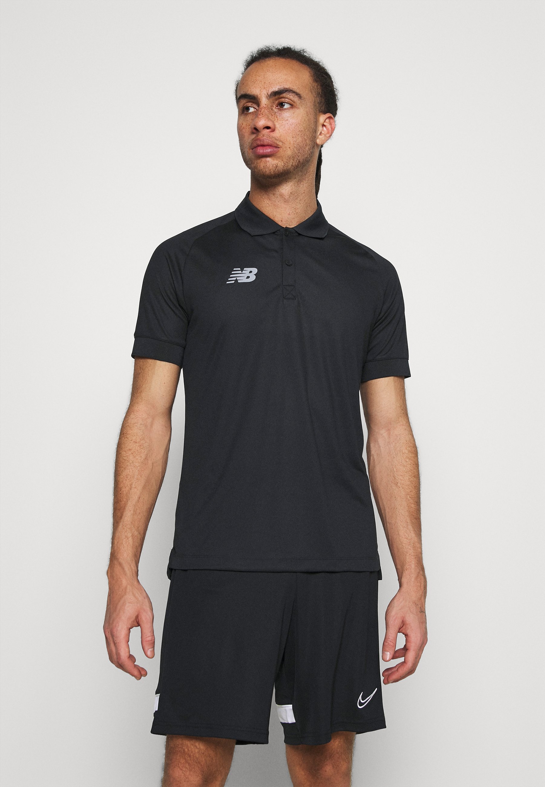 new balance sports top