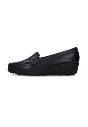 Scarpa slip-on in pelle nera con punta arrotondata, dettagli di cucitura sottili e suola a zeppa per un'altezza maggiore. Texture liscia su tutta la superficie.