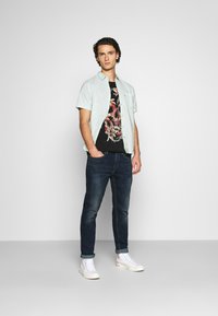 Levi's® 502™ TAPER HI-BALL - Calças de ganga de perna direita - med indigo
