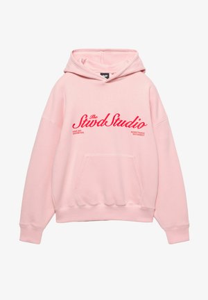 Pink hættetrøje lavet af blødt stof med en forlommekangaroo og rød broderet tekst. Designet med en hætte med snøre og ribstrikkede manchetter.