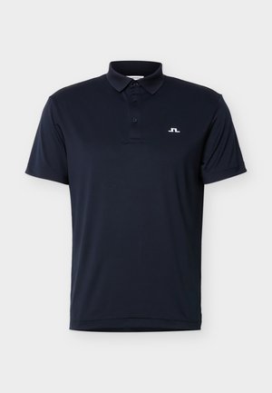 Πολύ σε σκούρο μπλε navy μπλουζάκι πόλο με κοντά μανίκια, τρία κουμπιά και μικρό λευκό λογότυπο στο αριστερό στήθος.