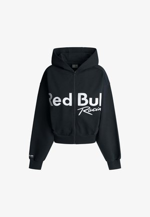 Melna rāvējslēdzēja džemperis ar kapuci, ar lieliem baltajiem "Red Bull Racing" burtiem uz priekšpuses. Izgatavots no mīksta strukturēta auduma.
