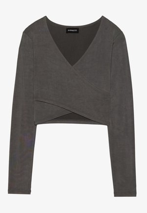 Grå langærmet crop top med en indviklet design og v-udskæring, der har glat stof og subtile syningsdetaljer. Mærkeetiket synlig indeni.
