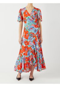 Robe portefeuille florale aux motifs vibrants rouge, bleu et vert. Dotée de courtes sleeves flottantes et d'une jupe fluide avec un ourlet au-dessus des chevilles.