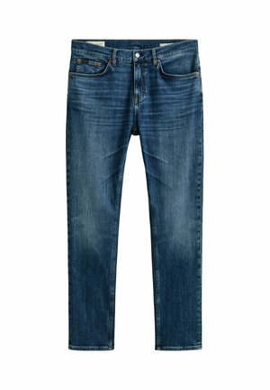 Dunkelblaue Denim-Jeans mit Vorderentaschen, Gürtelschlaufen und Knopfverschluss, zeigen leichte Verfärbungen an Oberschenkeln und Knien.