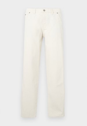 Balti tiesaus fasono džinsai iš džinso audinio, turintys sagų užsegimą, diržo kilpas ir penkias kišenes. Audinys yra lygios tekstūros.