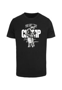 Black cotton t-shirt featuring a graphic of a boxer, text "THE GREATEST CHAMP" and "Glides with grace, strikes with power." in white.