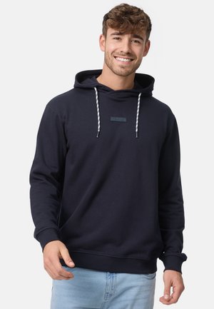 Marineblaue Kapuzenjacke aus Baumwollmischung mit einer vorderen Tasche, verstellbarem Kordelzug-Hoodie, gerippten Bündchen und einem kleinen Logo auf der Brust.