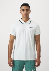 Nike Performance Poloshirt - barely green/black