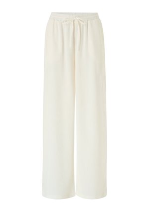 Pantalones de pierna ancha color crema con cintura elástica y cordón delantero, confeccionados en una tela ligera y texturizada.