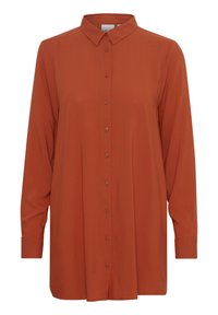 Chemise à manches longues de couleur rouille, avec un col, une texture lisse et des manches longues entièrement dotées de poignets à boutons.