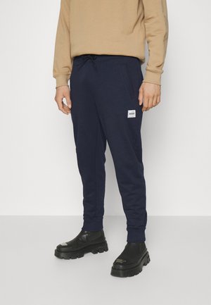 DOAK - Tracksuit bottoms - dark blue