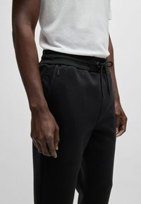 BOSS LAMONT - Tracksuit bottoms - black one