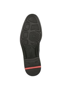 Suola di scarpa nera in gomma con un motivo testurizzato. Presenta una fascia di accento rossa lungo il tallone e un design del battistrada distinto per la trazione.