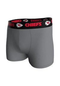 Boxer grigi con fascia in vita nera con la scritta "CHIEFS" in rosso e un piccolo logo. Texture liscia con design aderente.