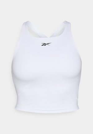 White athletic crop top made from smooth, stretchy fabric. Features a crisscross back design and a small black logo on the front.