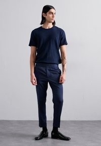 Filippa K TERRY CROPPED TROUSERS - Hlače - dusk blue