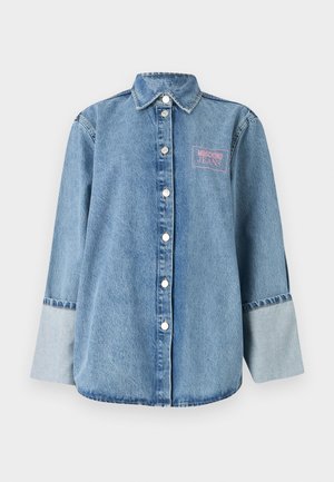 Light blue denim shirt with a button-down front, pointed collar, and an embroidered pink "Moschino Jeans" logo on the left chest.