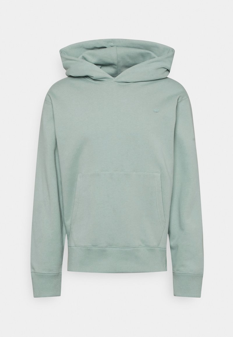 Světle zelená mikina s kapucí vyrobená z jemného materiálu, s přední kapsou a stahovací kapucí. Hladké manžety a lem. Minimální značení na hrudi.