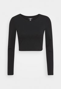 Svart kortärmad topp i slät tyg, med rundad halsringning och åtsittande silhuett. Inga synliga fästen eller mönster.