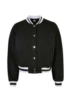 Juoda bombonešio striukė su baltomis dryžuotomis apykaklėmis ir rankogaliais, spaudžiamomis sagomis užsegama, dvi šoninės kišenės ir trumpintas dizainas. Minkštos tekstūros audinys.