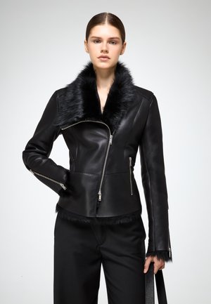 RENETA - Veste en cuir - black