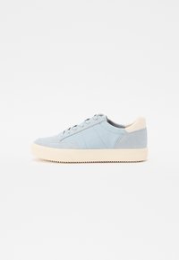 Light blue sneaker with a smooth leather finish, featuring a low profile, round toe, and contrasting cream rubber sole.