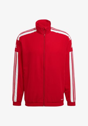 Red athletic jacket featuring a high collar, front zipper, ribbed cuffs and hem, with white stripes on sleeves and logo on the shoulder.