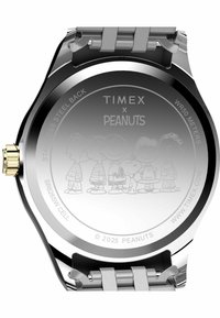 Timex x Peanuts watch back, stainless steel with polished finish. Features engraved character design, WR50 meters, silver and gold accents.