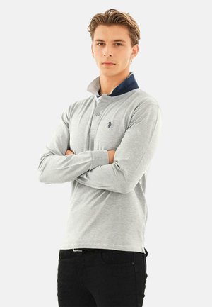 Light gray long-sleeve polo shirt with a navy blue collar, featuring a contrast placket and small logo on the left chest.