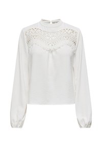 White long-sleeve top featuring a textured fabric, lace detailing across the chest, and a high neckline with a back keyhole closure.