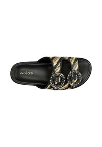 Sandale slide noire avec des brides à motif zigzag beige et noir et deux boucles décoratives ornées de bijoux sur le dessus.