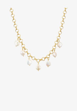 Guld kædedesignet med ujævne, ovale hvide perler hængende fra led, der viser forskellige teksturer og subtil iridescens i perlerne.