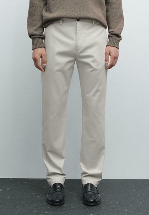 TAPERED FIT  - Pantaloni - beige