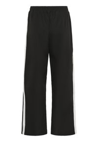 Zwarte sportbroek met een wijde pasvorm, elastische tailleband en contrasterende witte zijstrepen. Gemaakt van soepel, lichtgewicht stof.