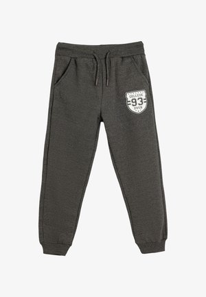 Grijze joggingsbroek gemaakt van zachte stof, met een elastische tailleband met trekkoord, zijzakken en een gedrukt college-embleem.