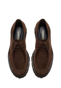 Pair of brown suede lace-up shoes with thick black soles, viewed from above, displaying "DERIMO" branding inside.