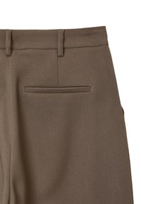Brown dress pants featuring a textured fabric, two belt loops, and a single back pocket with a sleek finish.