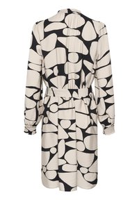 Long-sleeved dress in lightweight fabric, featuring a black and cream abstract pattern, cinched waist, and gathered cuffs.