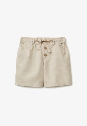 Beżowe szorty bawełniane z elastycznym pasem, sznurkiem do wiązania, dwoma drewnianymi guzikami z przodu i bocznymi kieszeniami, położone płasko na białym tle.