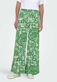 Groene en crèmekleurige wijde broek met een bloemen- en paisleypatroon, rekbare tailleband met een trekkoord en een zachte textuur.