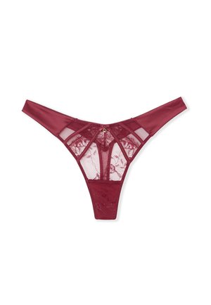 String en dentelle bordeaux avec insert en maille et détail en métal doré à l'arrière. Design élégant avec une couverture minimale et un motif floral.