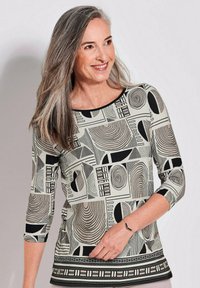 Langärmliges Oberteil mit geometrischem Muster in Schwarz und Beige, aus einem glatten Stoff mit rundem Halsausschnitt und geradem Saum.