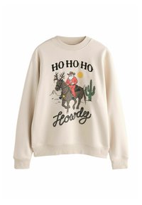 Beige sweatshirt med grafik av jultomte i cowboyhatt som rider på ren, med kaktusar, sol och texten "HO HO HO Howdy."