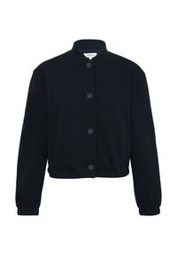 Veste cropped bleu foncé en tissu texturé, dotée d'un col montant, de boutons-pression sur le devant et de poches latérales.