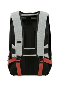 Black and gray backpack back panel with padded mesh, adjustable red shoulder straps, and a horizontal chest strap.