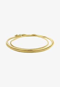 Geselecteerd, gold-coloured