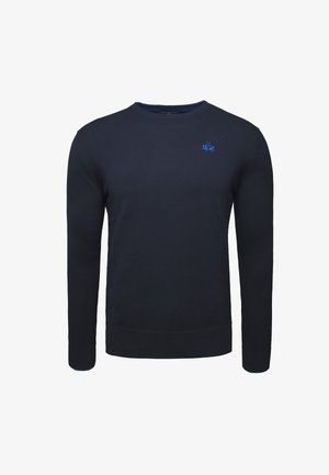 Tummansininen neulepaita pitkillä hihoilla. Ominaisuuksiin kuuluu pyöreä kaula-aukko ja pieni sininen brodeerattu logo rinnassa. Sileä kangas.